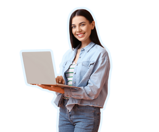 Person in a denim jacket and striped shirt holding an open laptop.